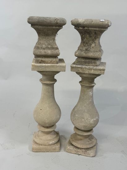 Pair of stone baluster columns, square base.
61...