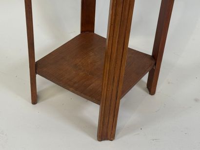 Small octagonal pedestal table in molded...