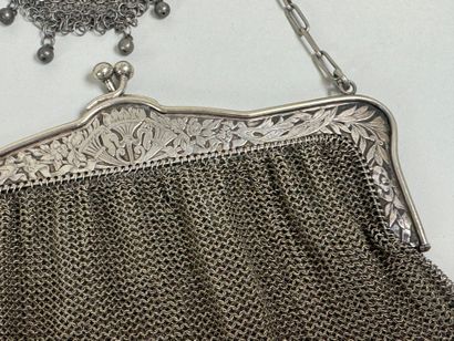 Large silver-plated evening bag with chased...