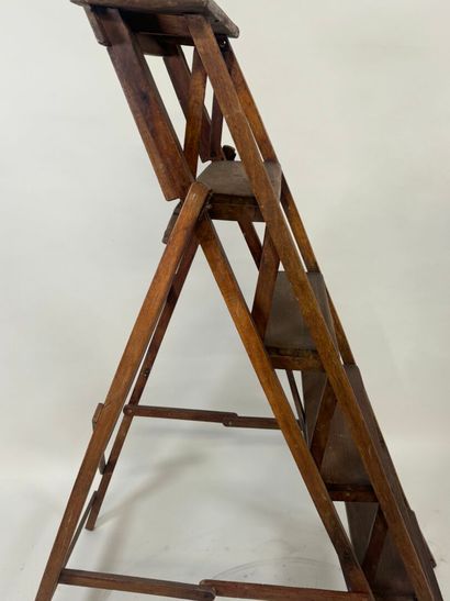 Six-step wooden library staircase.
133 x...