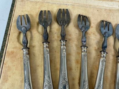 Six silver-plated oyster forks with foliate...