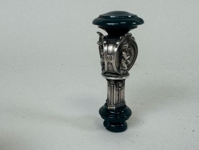 Metal and hardstone cachet with faceted decoration...