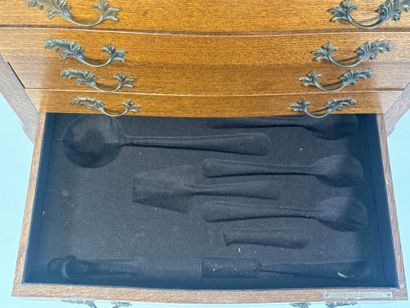 ERCUIS.
Moulded oak silver cabinet opening...