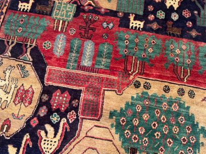 Hand-knotted wool rug decorated with landscapes...