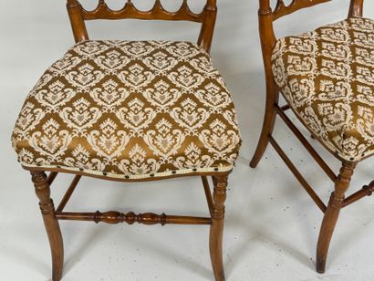 Pair of molded cherrywood chairs, fabric...