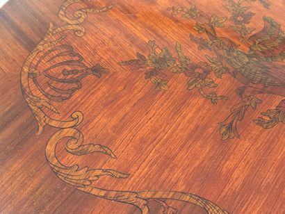 Oval tripod pedestal table in marquetry decorated...