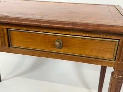 Flat desk in molded wood opening with two...