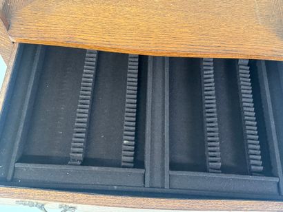 ERCUIS.
Moulded oak silver cabinet opening...