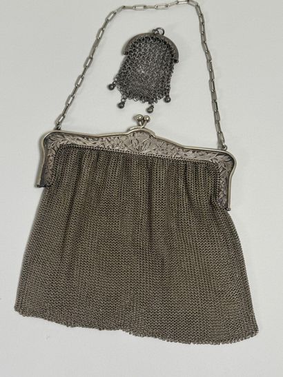 Large silver-plated evening bag with chased...