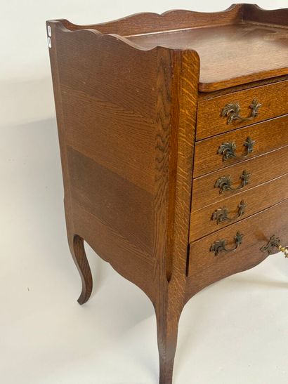 ERCUIS.
Moulded oak silver cabinet opening...