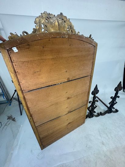 Large wood and gilded stucco mirror with...