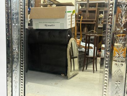Large Venetian mirror with richly foliated...