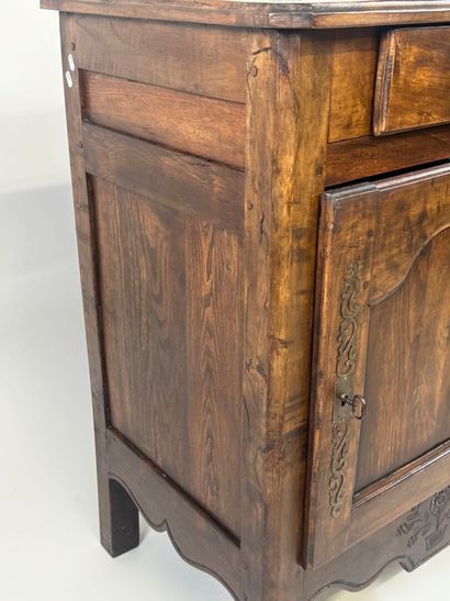Moulded wood jam cupboard opening with a...