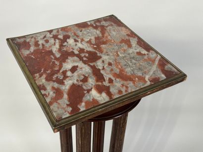 Moulded wood and brass sellette with four...