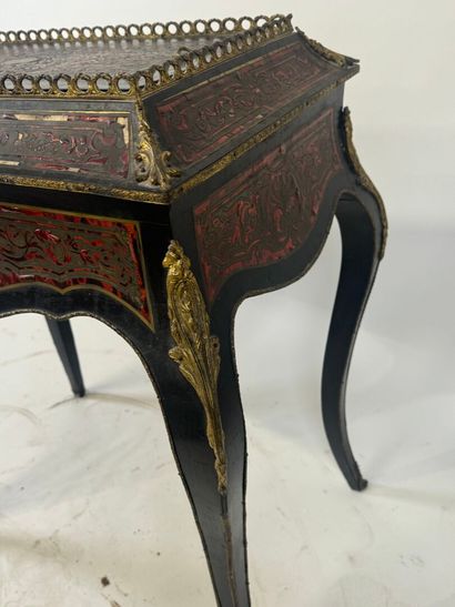 Planter in blackened wood and brass fillet...