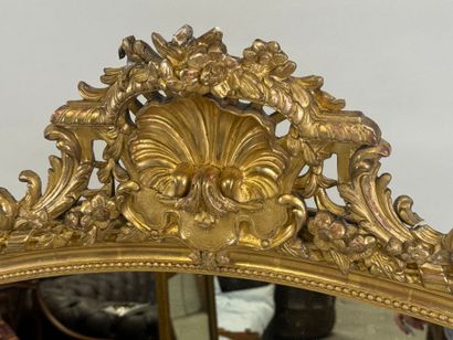 Large wood and gilded stucco mirror with...