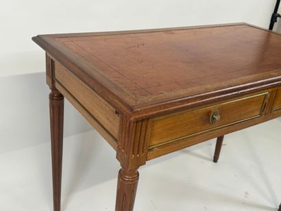 Flat desk in molded wood opening with two...