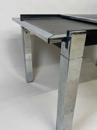 Extendable table in stained wood and chrome.
70s.
73...