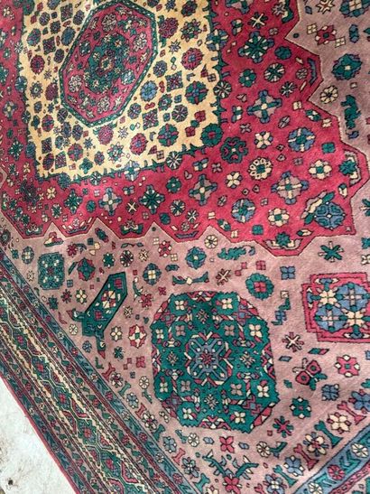 *
Large wool carpet with geometric and stylized...