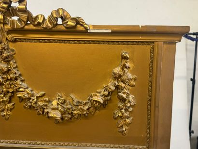 Large mirror in wood and gilded stucco, the...