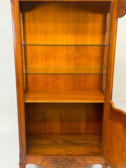 Moulded cherrywood display cabinet opening...