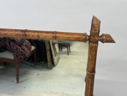 Rectangular bamboo and glass mirror.
93 x...