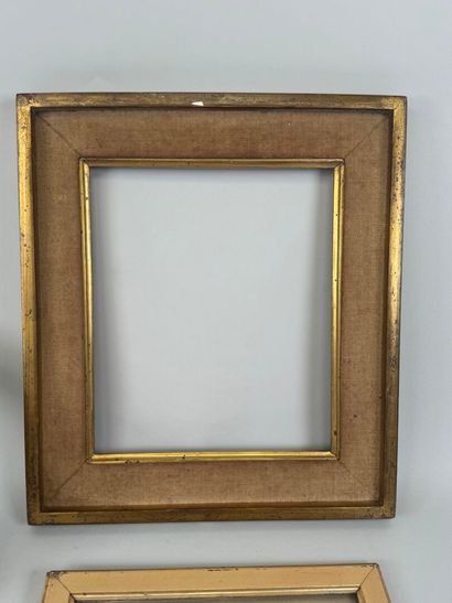Set of four giltwood and blackened wood frames,...