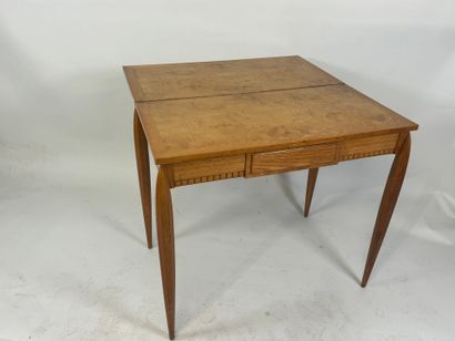 Natural wood games table, tapered legs.
73.5...