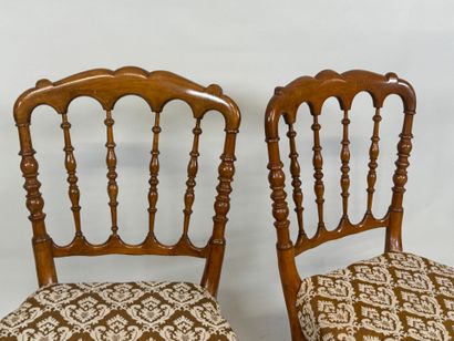 Pair of molded cherrywood chairs, fabric...