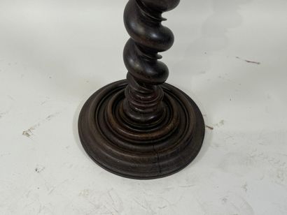 Blackened wood saddle, circular base, twisted...