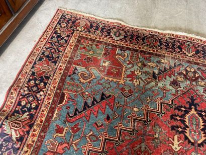 Large hand-knotted wool rug decorated with...