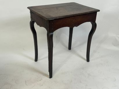 Small molded oak table opening with one drawer.
64...