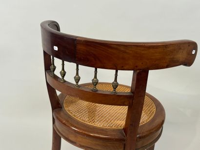 Desk armchair in molded wood and brass, with...