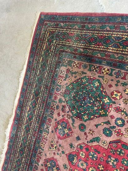 *
Large wool carpet with geometric and stylized...