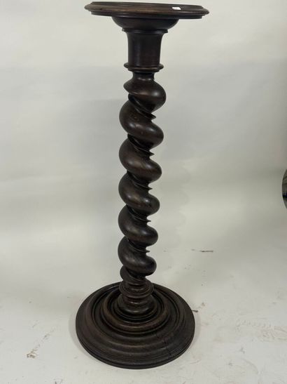 Blackened wood saddle, circular base, twisted...
