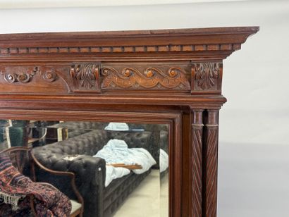 Large molded and carved wood mirror with...