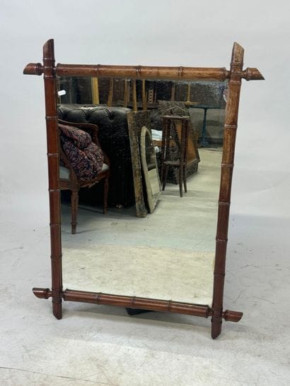 Rectangular bamboo and glass mirror.
93 x...