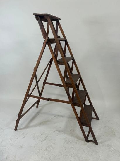 Six-step wooden library staircase.
133 x...