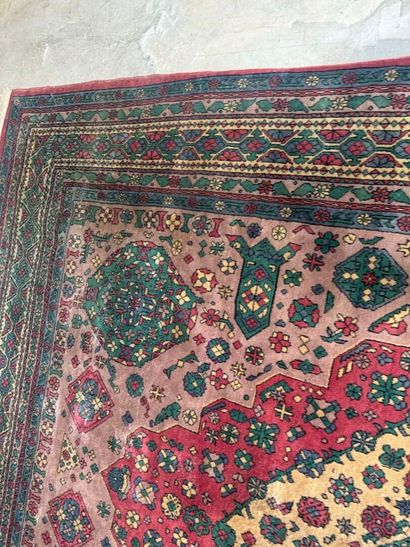 *
Large wool carpet with geometric and stylized...