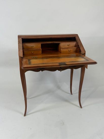 Cherrywood sloping desk opening with a flap...