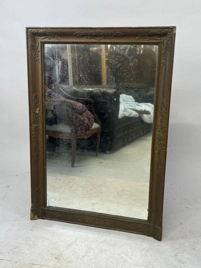 Rectangular wood and gilded stucco mirror...