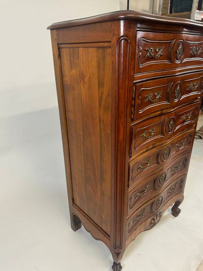 Cherry wood chiffonier opening with six drawers.
Louis...