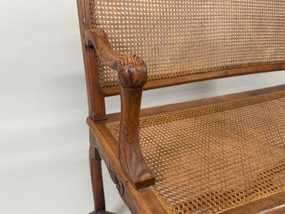 Molded and carved wood bench with leafy shell...