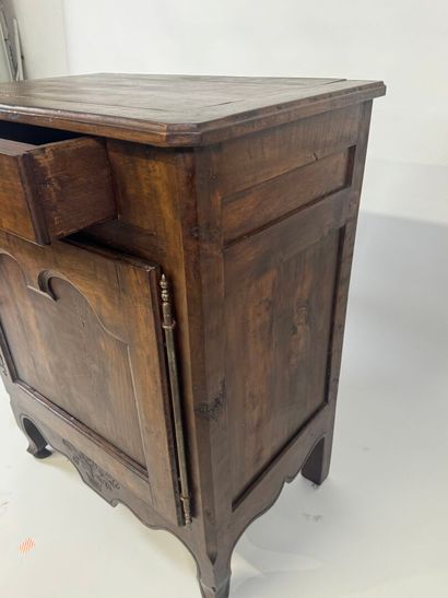 Moulded wood jam cupboard opening with a...