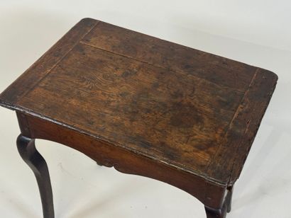 Small molded oak table opening with one drawer.
64...