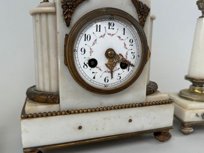 White marble, bronze and brass set decorated...