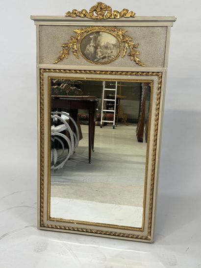 Lacquered and molded wood trumeau decorated...