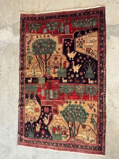 Hand-knotted wool rug decorated with landscapes...