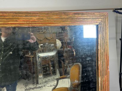 Large rectangular mirror in wood and gilded...