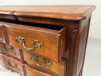 Molded wood chest of drawers opening with...
